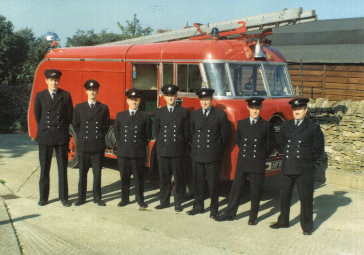 Members of the Broadway Fire Brigade lined up in front of their water tender c.1969