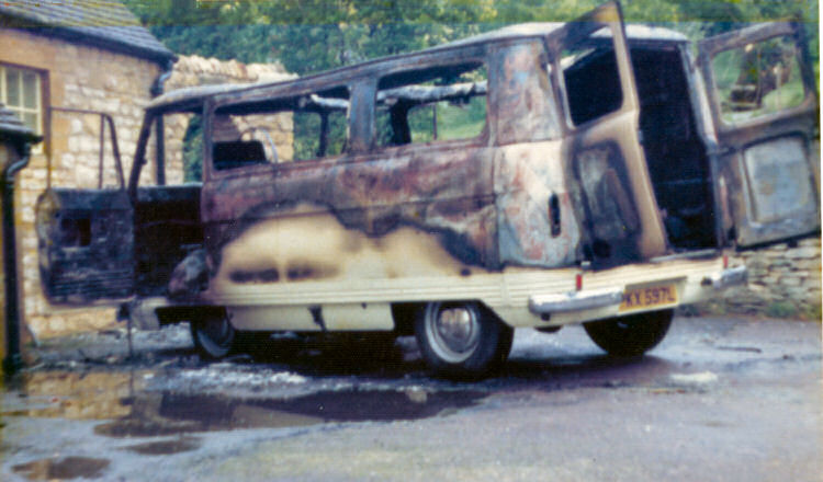 Burnt out camping van at Chipping Campden c1975