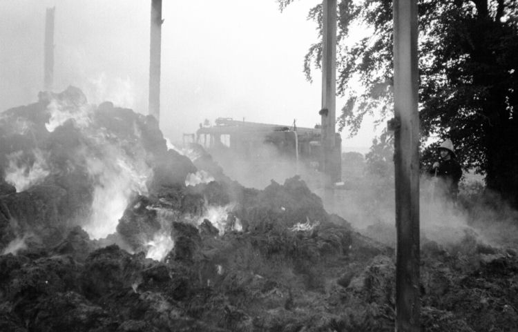 John Oliver keeps a watch on the fire at Cropthorne June 1977