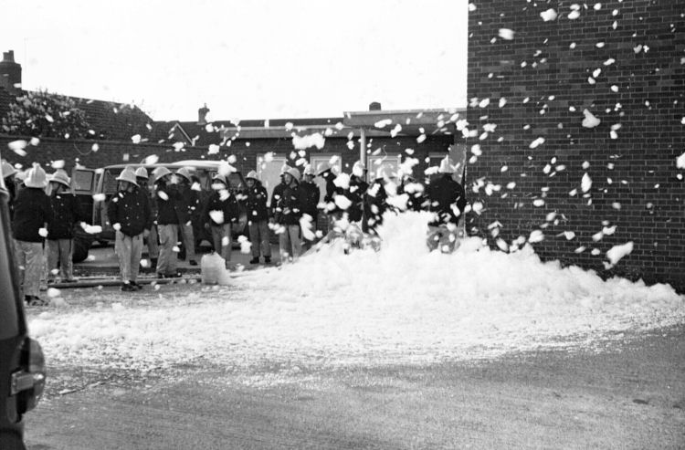 The wind catches the foam